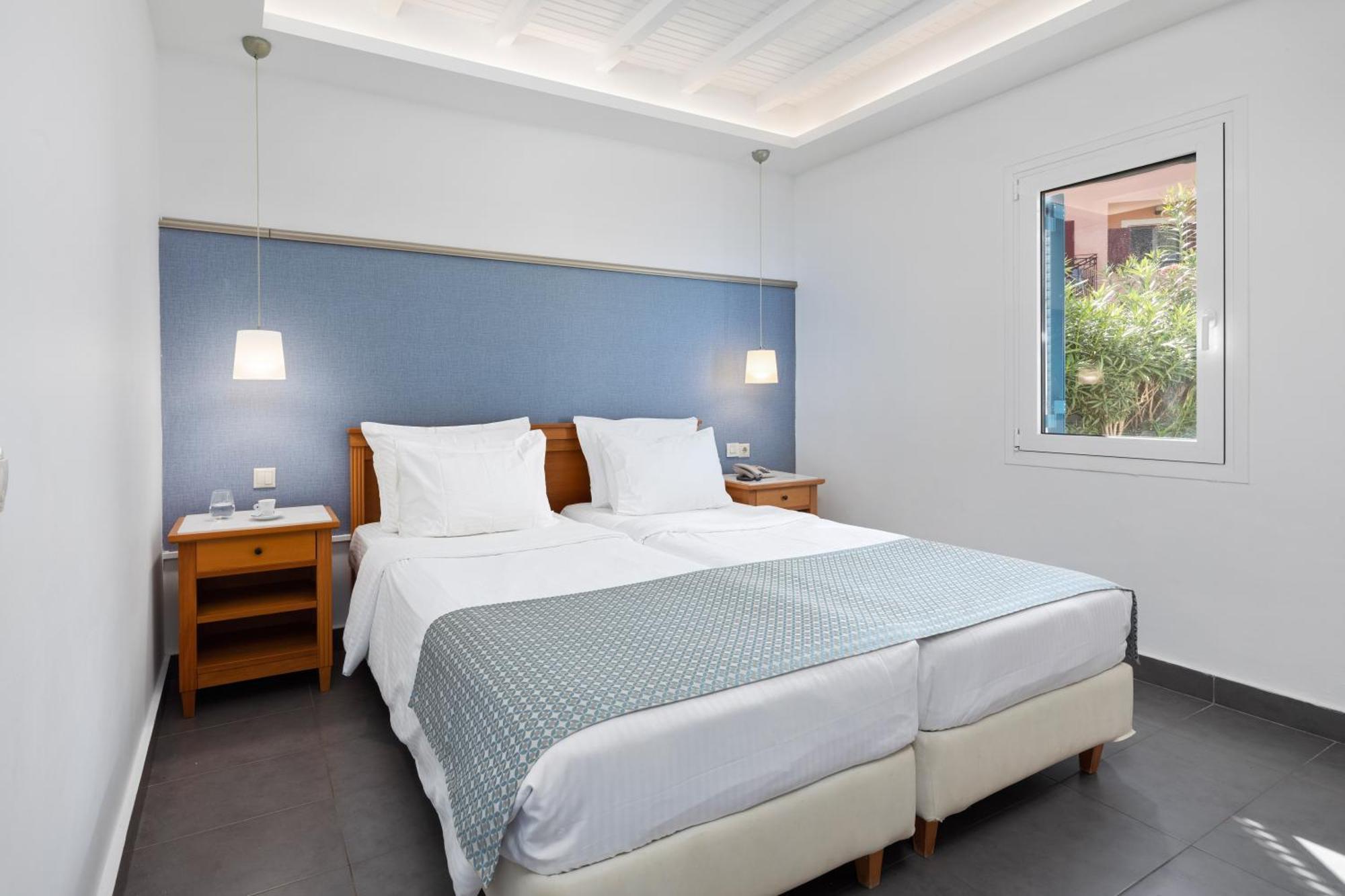 Sentido Apollo Palace 메손기 외부 사진 A bedroom at the hotel